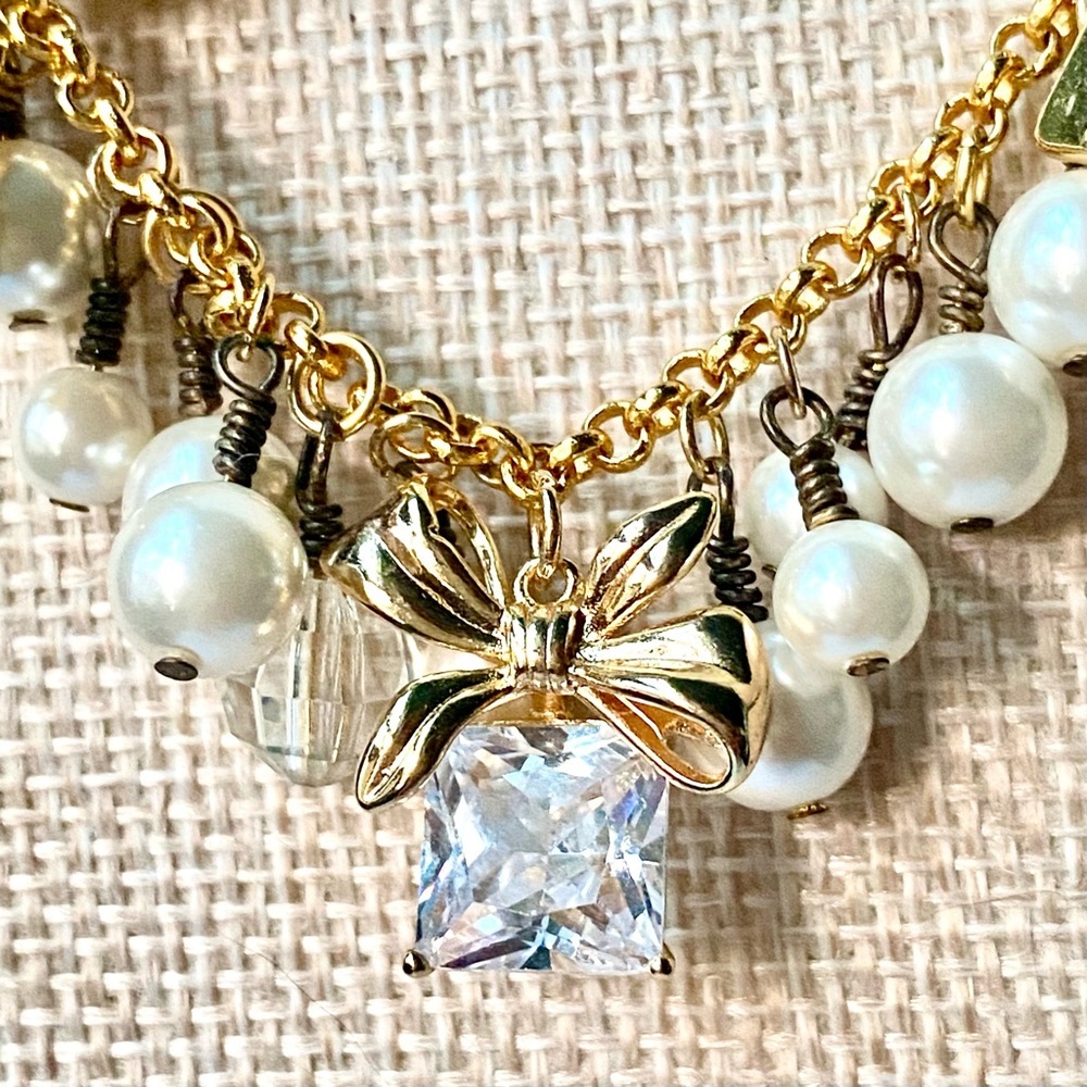 LilyLilyL Charming Gold-Tone & Pearl Statement Necklace w/Bow & Crystal Charms - Picture 4 of 10